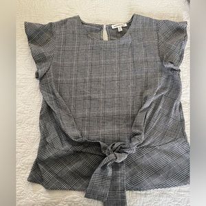 Black and white top, bow in front , new without tags
